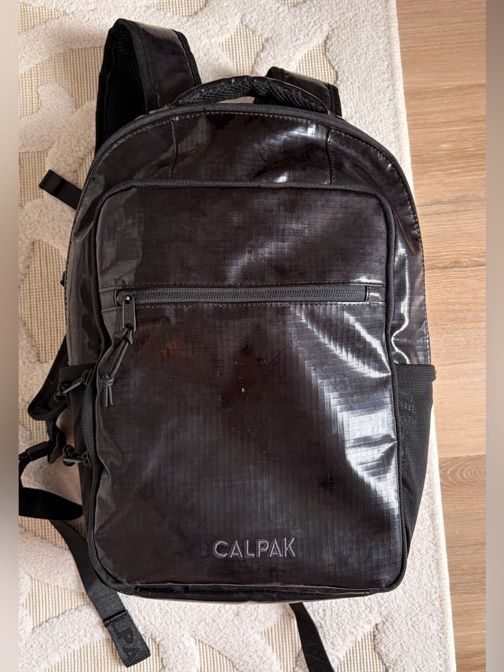 Calpak Terra Black Glossy Backpack